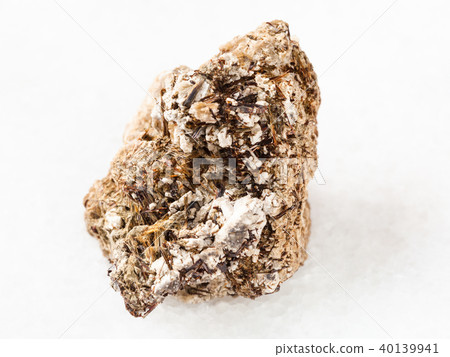 Astrophyllite crystals in raw Natrolite stone Astrophyllite crystals in raw Natrolite stone 40139941