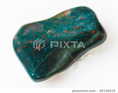 tumbled green Heliotrope gem stone on white 40140019