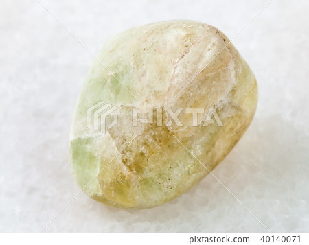 polished Datolite gemstone on white 40140071