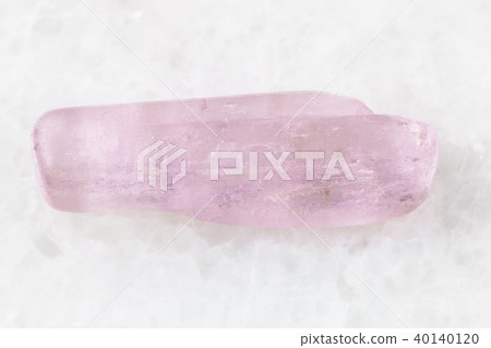 tumbled kunzite gemstone on white 40140120