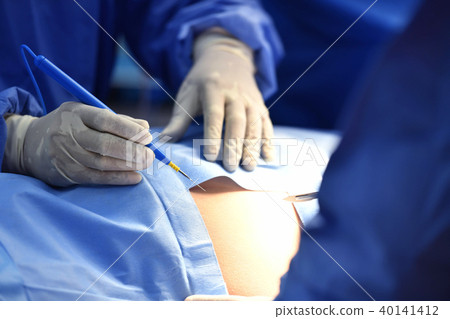 Team surgeon at work on operating room Team surgeon at work on operating room 40141412