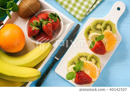 Healthy breakfast fruits and ricotta sandwiches. Healthy breakfast fruits and ricotta sandwiches. 40142507