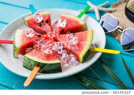 Watermelon slice popsicles with colorful stick 40145107