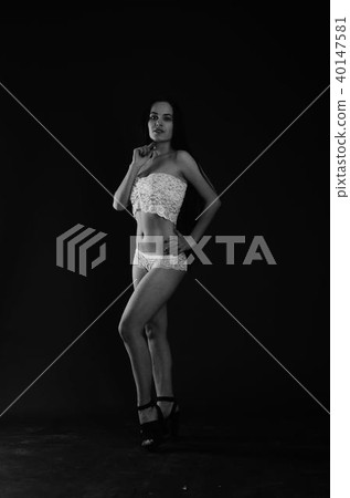 Young beautiful woman in a fashionable linen luxury brunette in the Studio. 40147581