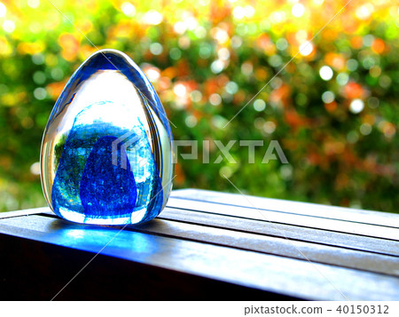Egg shaped glass paper weight blue outdoor Egg shaped glass paper weight blue outdoor 40150312
