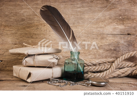 letter and a quill in the inkwell 40151910