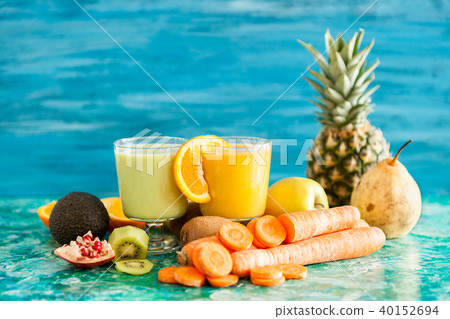Front view of two glasses with detox smoothies Front view of two glasses with detox smoothies 40152694