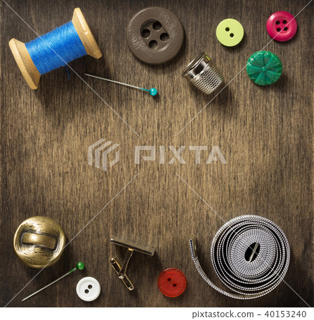 sewing tools on wooden background 40153240