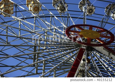 ferris wheel in amusement park on blue sky 40155212