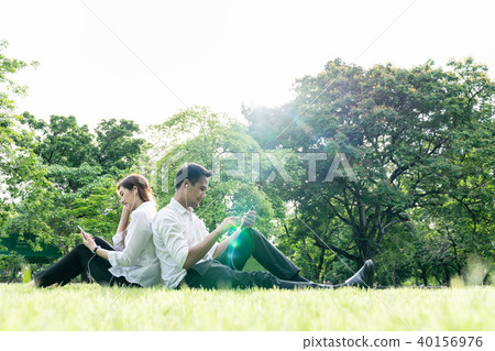 Young asian couple,lover holding earphone. Young asian couple,lover holding earphone. 40156976