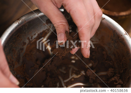 female teen hand making chocolate truffles 40158636