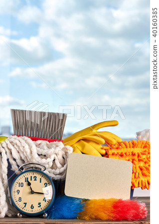 Cleaning products and alarm clock. 40160385