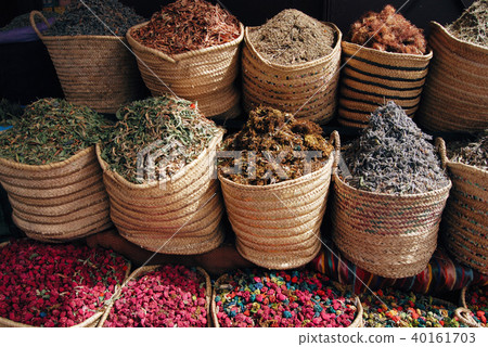 Dried herbs and flowers in the baskets 40161703