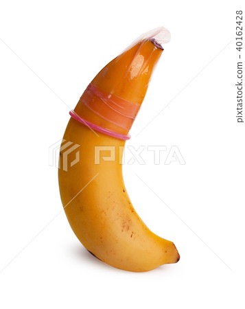 Condom on banana against , Safe sex concept. 40162428