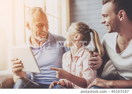 Grandpa, dad and little girl at home 40163587
