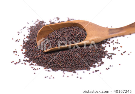 Black mustard seeds in a wooden spoon isolated on white background 40167245