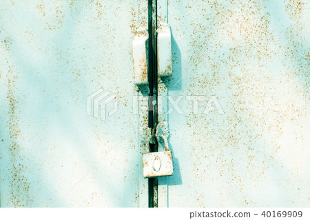 closeup metal door with lock, grungy style closeup metal door with lock, grungy style 40169909