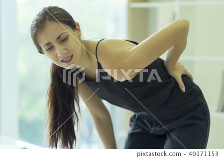 Businesswoman suffering from back and waist pain 40171153