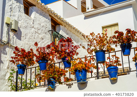 Stylish balcony with a metal railing 40173820
