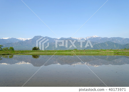 Flooded rice fields and northern alps Ikedacho 40173971