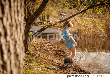 blond child pee in the lake blond child pee in the lake 40179065