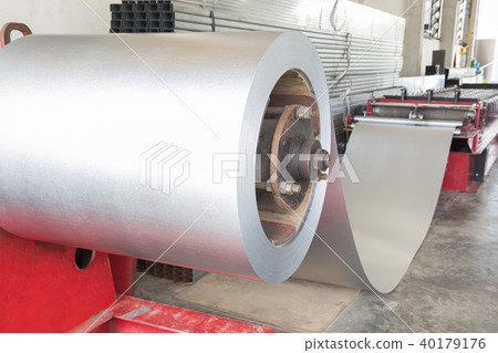 Coiled steel in metal sheet rolling machine Coiled steel in metal sheet rolling machine 40179176