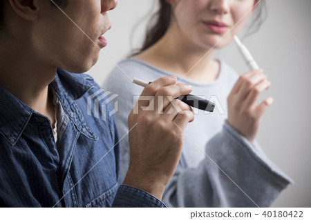 Men and women who smoke heated cigarettes Men and women who smoke heated cigarettes 40180422