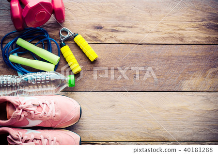 fitness concept with Exercise Equipment on wooden fitness concept with Exercise Equipment on wooden 40181288