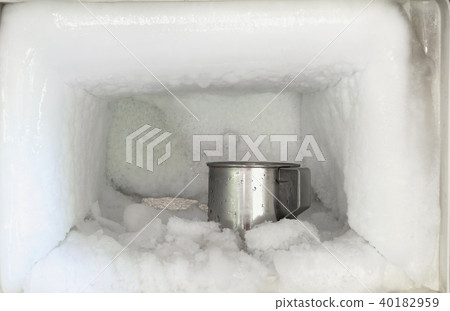 Stainless steel drinking water glass in freezer 40182959