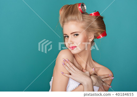 funny blond woman over blue background 40184655