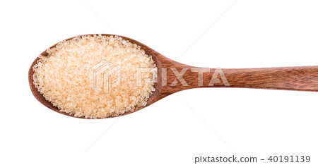 Brown sugar in wooden spoon on white background Brown sugar in wooden spoon on white background 40191139