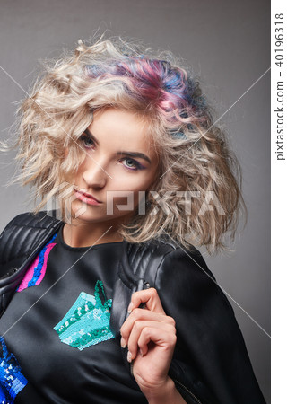 Portrait of young woman with trend dyed hair Portrait of young woman with trend dyed hair 40196318