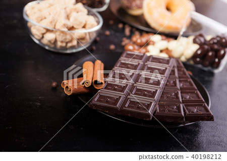 Candies and donuts next to other sweets Candies and donuts next to other sweets 40198212