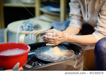 hands of woman making clay object hands of woman making clay object 40198970