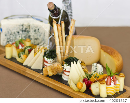 Cheese plate: roquefort with blue mold, cheddar Cheese plate: roquefort with blue mold, cheddar 40201817