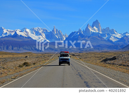 Old german vintage campervan traveling on the road from Los Glaciares National Park, Argentina Old german vintage campervan traveling on the road from Los Glaciares National Park, Argentina 40201892
