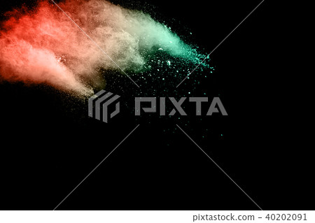 Multi color powder explosion isolated on black Multi color powder explosion isolated on black 40202091