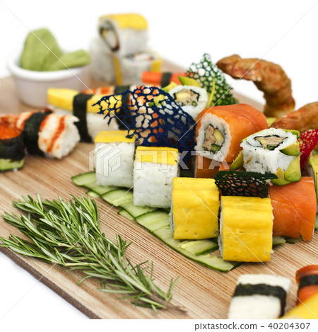 Japanese food - Sushi, sashimi, rolls on a wooden  40204307