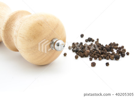 pepper mill of wood with peppercorns pepper mill of wood with peppercorns 40205305