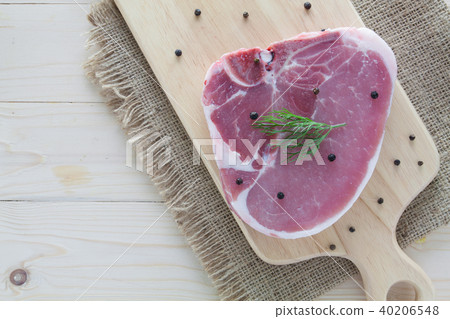 raw beef steak with ingredient. on a wooden table raw beef steak with ingredient. on a wooden table 40206548