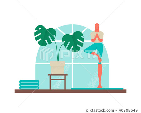 Boy doing yoga tree pose for healthy lifestyle 40208649