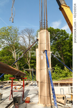 Installation of formwork for pouring concrete poles 40208934