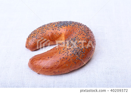 Many mixed breads and muffins on white background. Many mixed breads and muffins on white background. 40209372