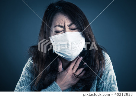 Woman wearing a mask Woman wearing a mask 40212933