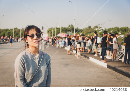 Asian woman portrait with group of people. Asian woman portrait with group of people. 40214088