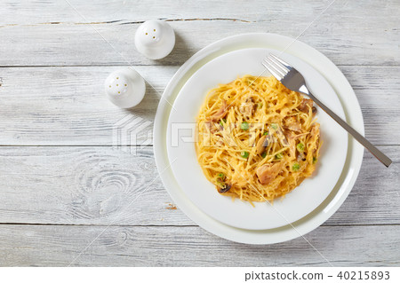 Tetrazzini - pasta, cream sauce, chicken, cheese 40215893