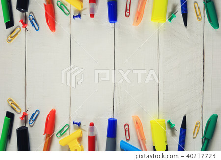 Stationary and working equipment placed on a white wooden floor and have copy space. 40217723