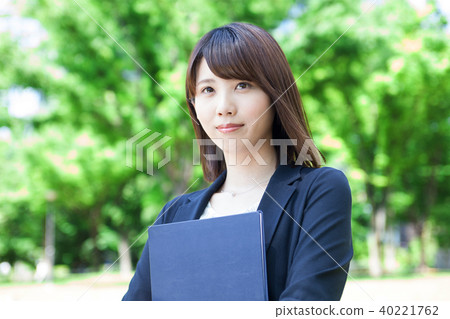 Young business woman outdoors Young business woman outdoors 40221762