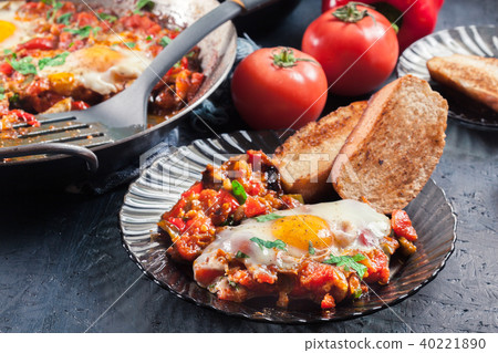 Portion of shakshuka on a plate Portion of shakshuka on a plate 40221890