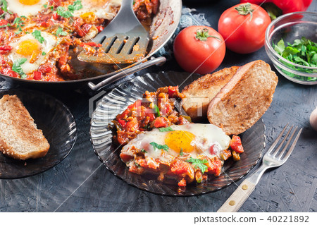 Portion of shakshuka on a plate Portion of shakshuka on a plate 40221892